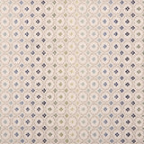 Broadloom carpet in a dense circle lattice with small floral accents in a ombré of green and blue on a cream field.