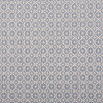 Broadloom carpet in a dense circle lattice with small floral accents in ecru on a blue field.