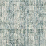 Broadloom carpet with textural weave in cream and turquoise blue.