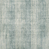 Broadloom carpet with textural weave in cream and turquoise blue.