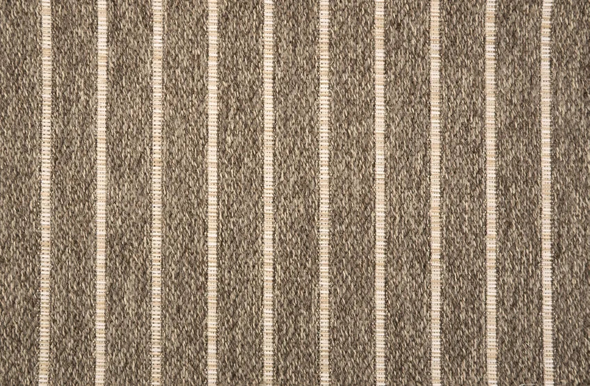 Broadloom carpet with subtle stripe in brown. 