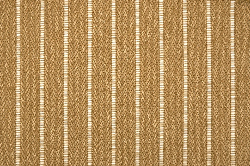 Broadloom carpet with subtle stripe in caramel.
