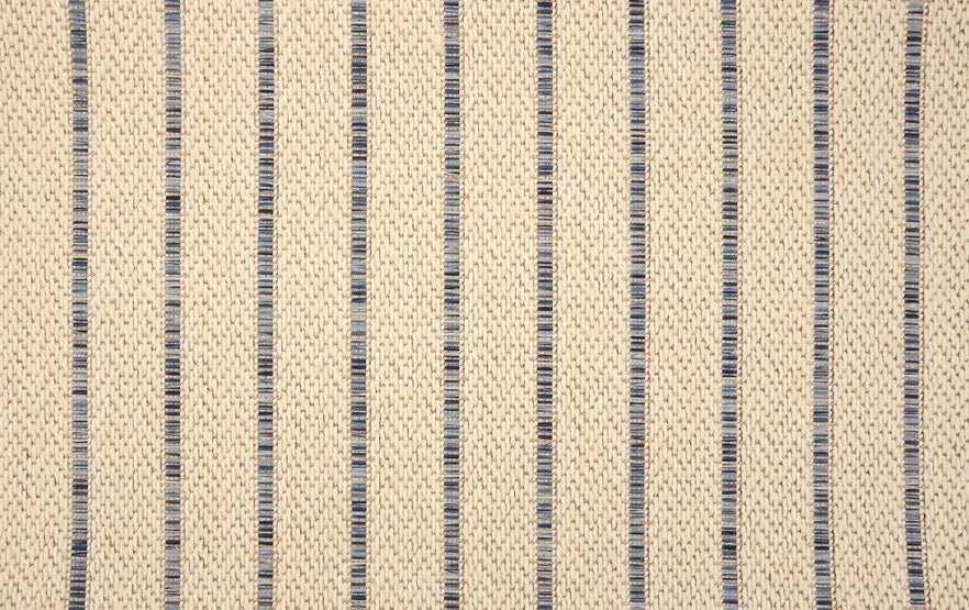 Broadloom carpet with subtle stripe in blue and cream.