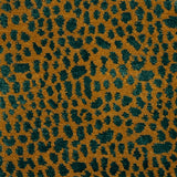 Handknotted rug with animal skin motif in orange and green. 