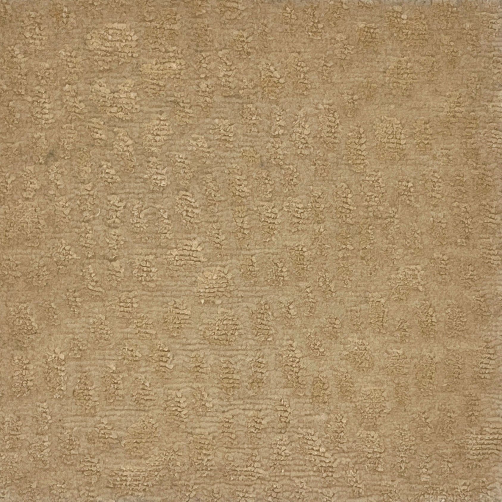 Handknotted rug with animal skin motif inc cream. 