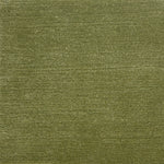 Handknotted rug with cut pile in solid green