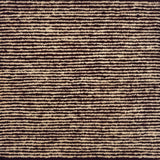 A close-up of a textured striped handknotted carpet with alternating horizontal bands of dark red and warm beige.