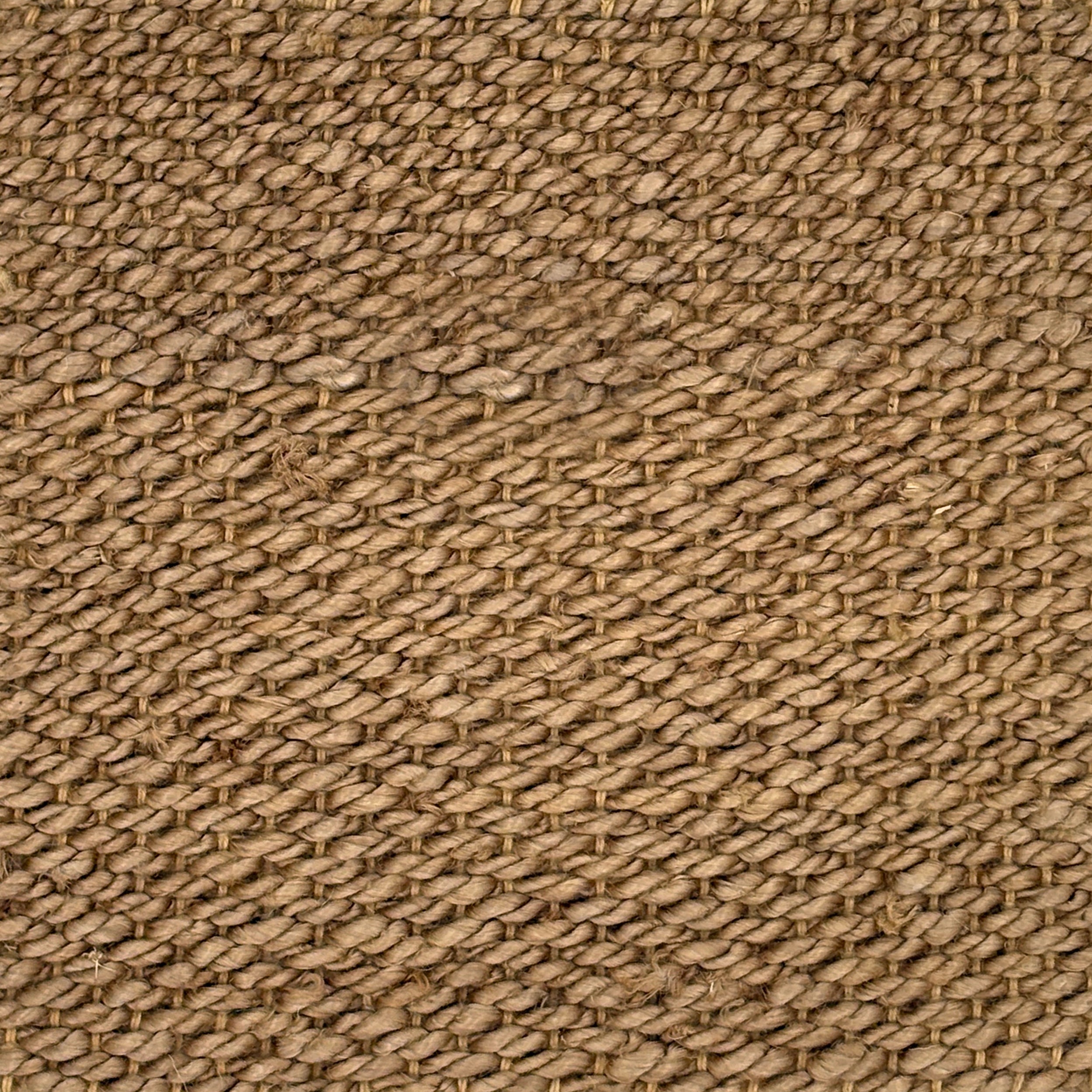 Close-up of a textured brown carpet