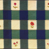 Blue, greena nd cream checkered fabric with floral patterns in alternating squares.