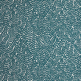 Detail of wallpaper in a scrolling stem and leaf print in turquoise on a white field.