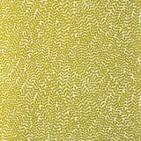 Detail of wallpaper in a scrolling stem and leaf print in mustard on a cream field.