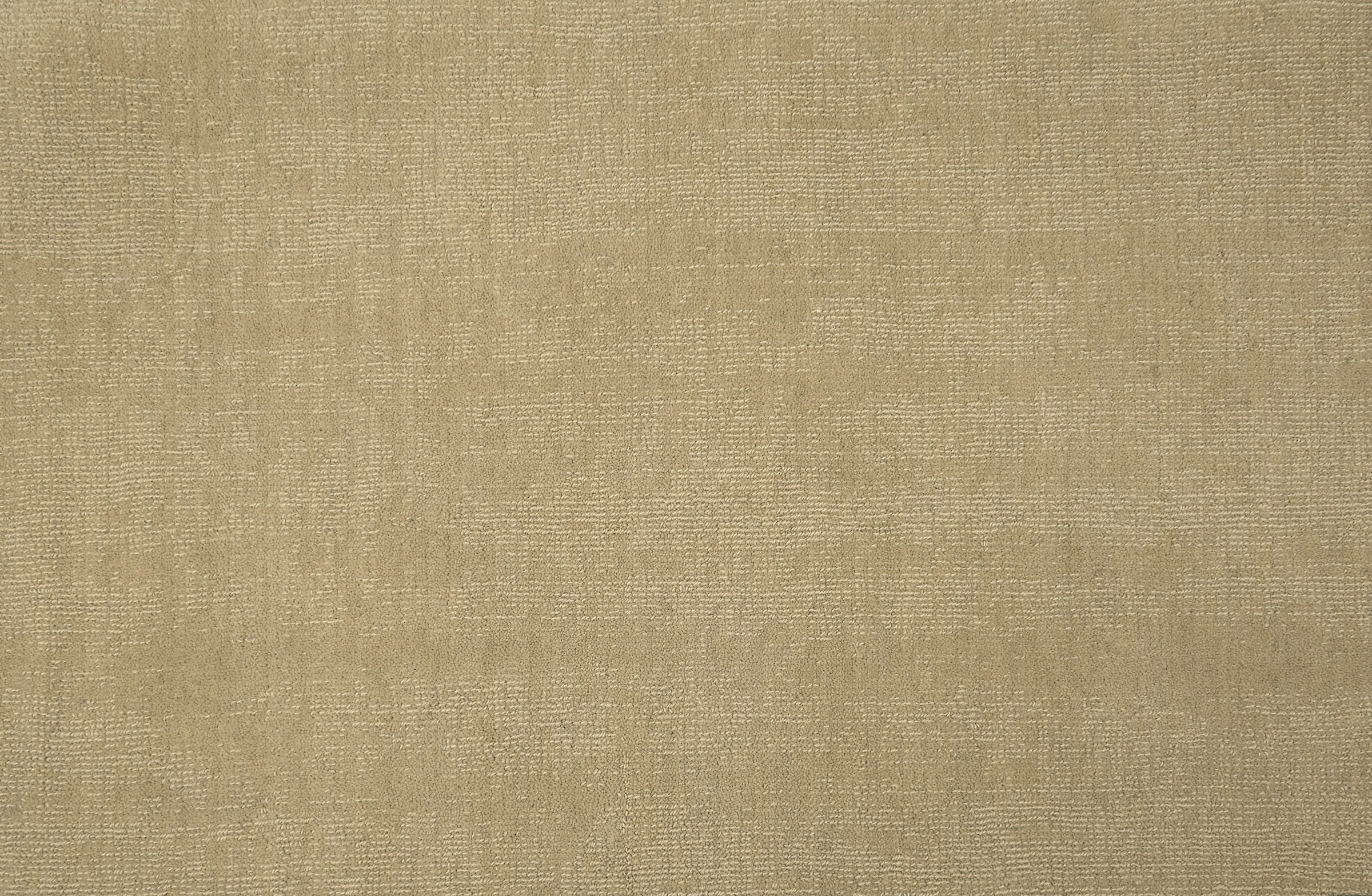 Solid broadloom carpet in ecru.