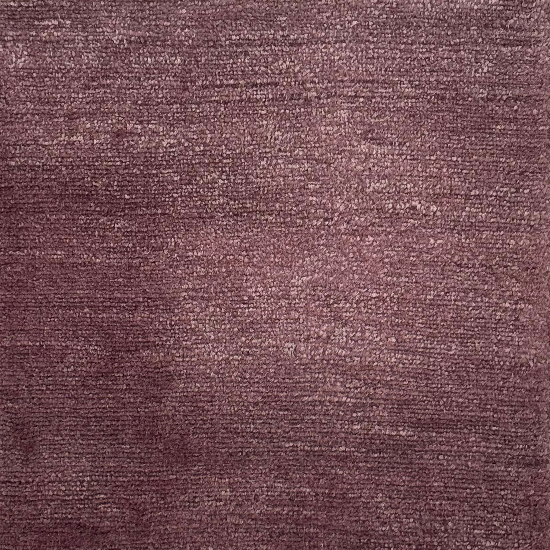 Handknotted rug in pashmina and silk in solid cut pile in purple.