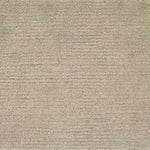 Handknotted rug in wool and merino in solid cut pile in warm beige. 