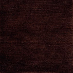 Handknotted rug in wool and merino in solid cut pile in dark brown.