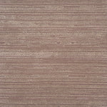 Handknotted rug in a textrural rib in light purple. 