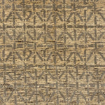 Handknotted rug with linear star design in grey on a mottled beige field. 