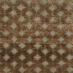 Handknotted rug with a diamond lattice design in grey on a brown field. 