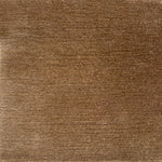 Handknotted cut pile rug in warm taupe.