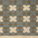 Handknotted rug with geometric mosaic design in slate blue, grey and cream. 