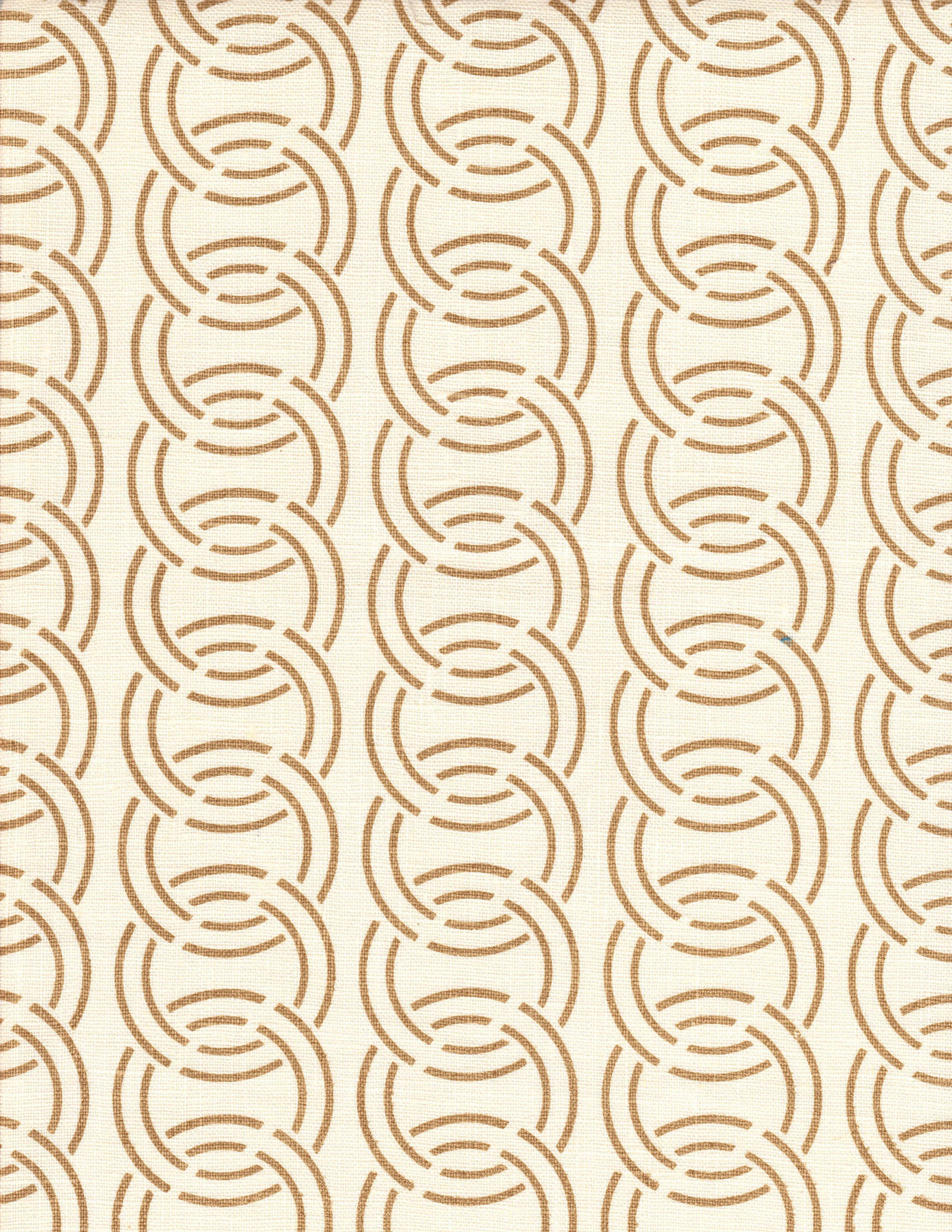 Detail of fabric in an interlocking circular pattern in brown on a cream field.