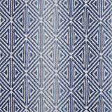 Broadloom carpet with triangle pattern with an ombré background in shades of blue. 