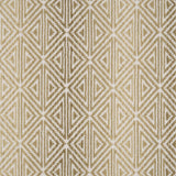 Broadloom carpet with triangle pattern with an ombré background in shades of tan.