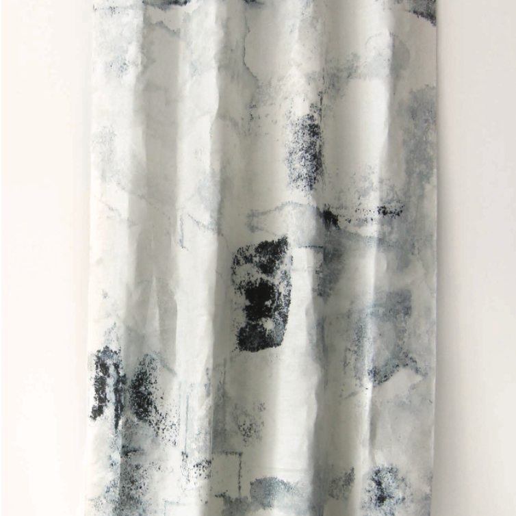 White curtain with black abstract pattern on a white background