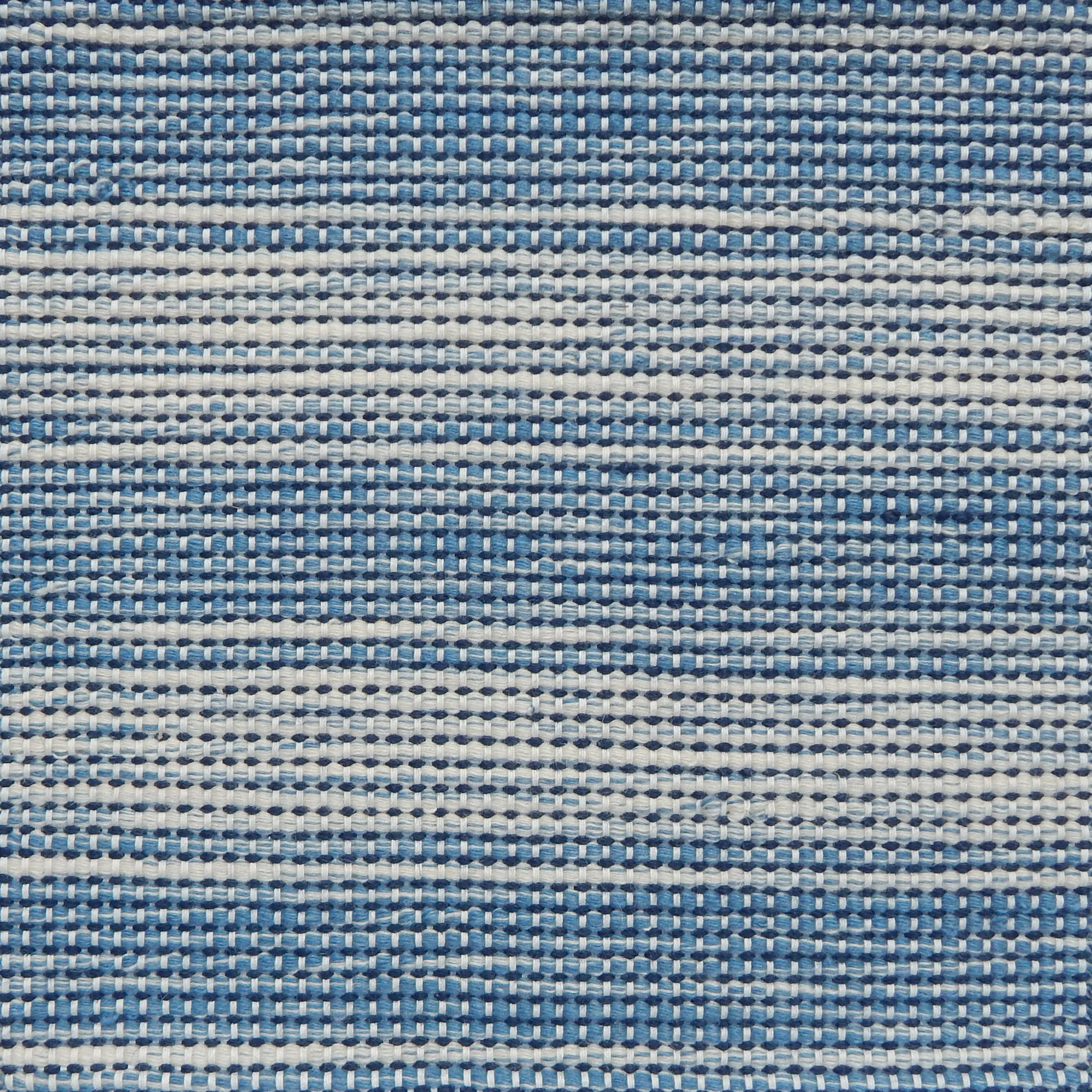 Flatweave rug in a subtle stripe of white and bright blue