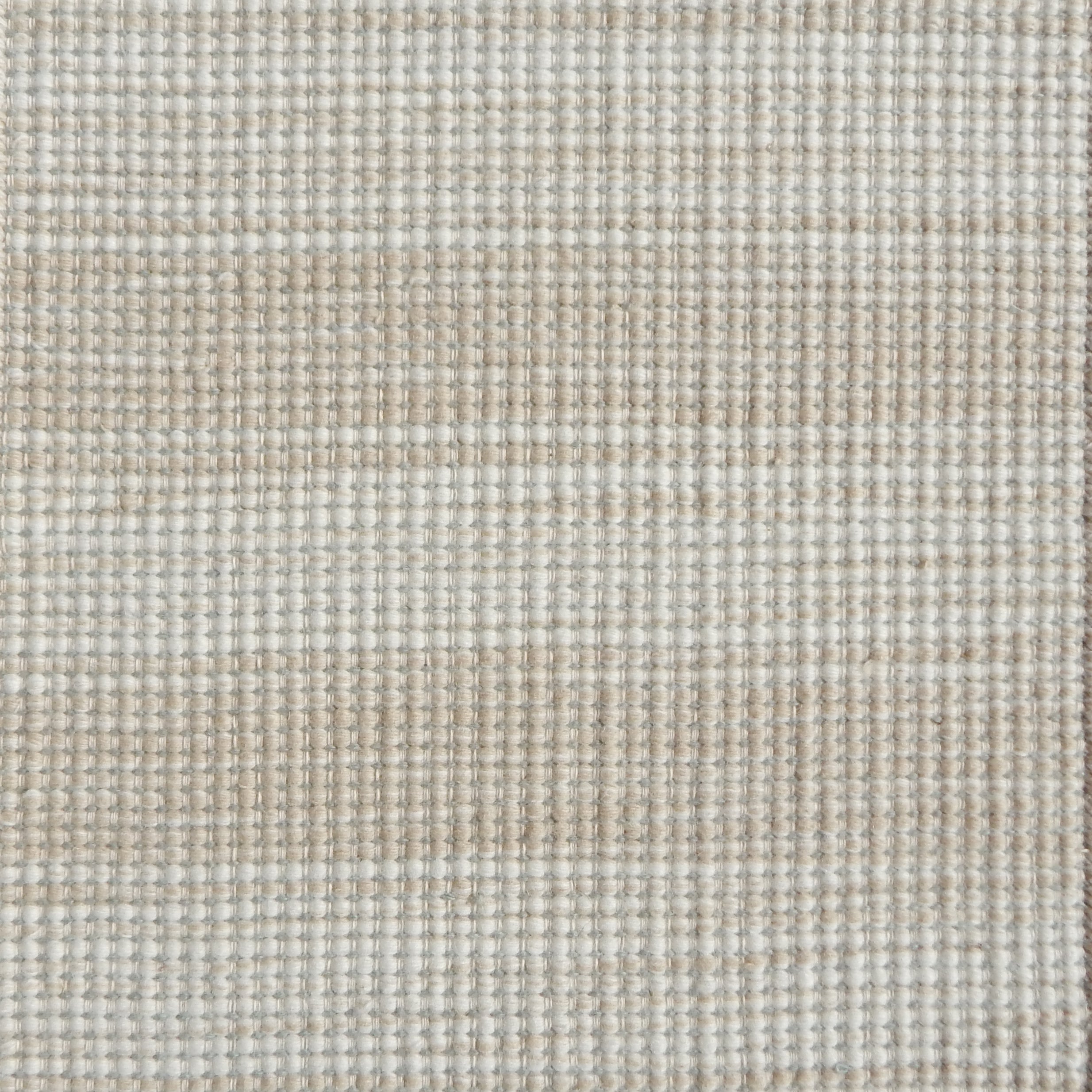 Flatweave rug in a subtle stripe of white and beige.