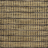 Textured rug with a taupe, brown and tan checker pattern