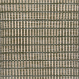 Textured rug with a sage green and beige  checker pattern