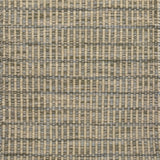 Textured rug with a grey and beige checker pattern