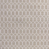 Handwoven wool rug with an oval and diamond lattice pattern in shades of cream and beige. 