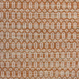Handwoven wool rug with an oval and diamond lattice pattern in shades of orange and tan. 