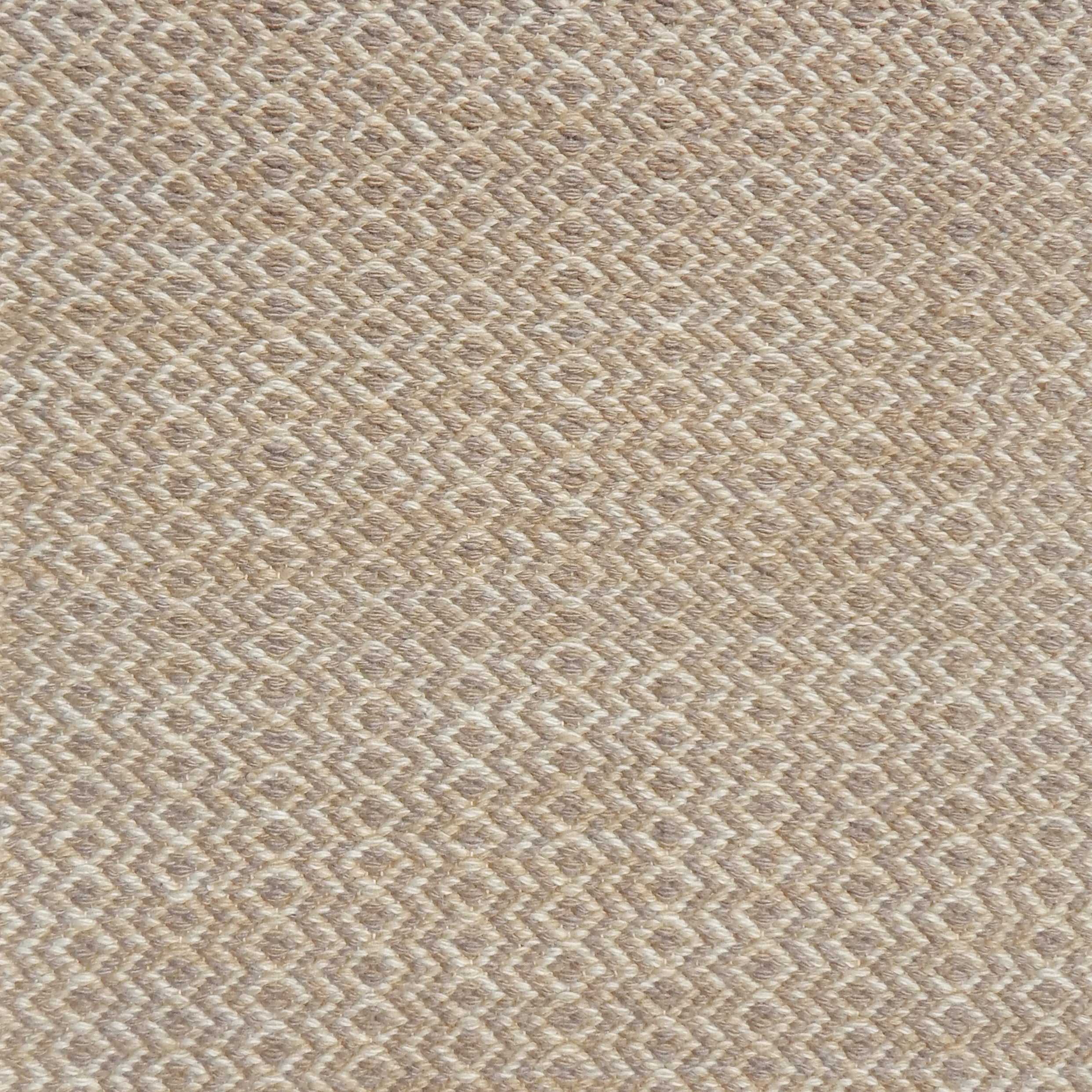Flatweave rug with an diamond stripe pattern in cream and taupe