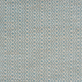 Flatweave rug with an diamond stripe pattern in cream and turquoise