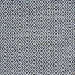 Flatweave rug with an diamond stripe pattern in cream and heather blue