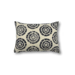 Rectangular throw pillow in a circulart dot pattern made of small dashed lines in navy blue printed on cream linen.