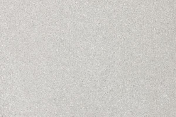 Solid cut pile broadloom carpet in white.