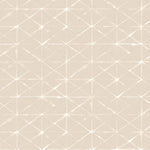 Detail of fabric in a mottled lattice print in white on a cream field.