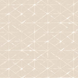 Detail of fabric in a mottled lattice print in white on a cream field.