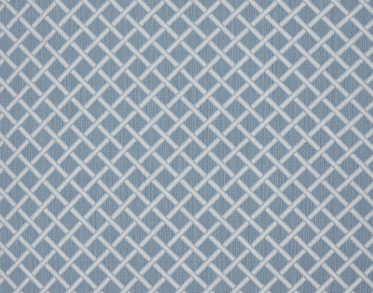 Broadloom carpet in a classic lattice in white on a blue field.