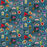 Collection of colorful embroidered patches on a denim fabric background