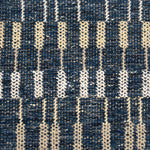 Handwoven rug detail in a contemporary stripe design in blue and cream
