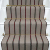 Striped flatweave runner in light grey and brown on white staircase