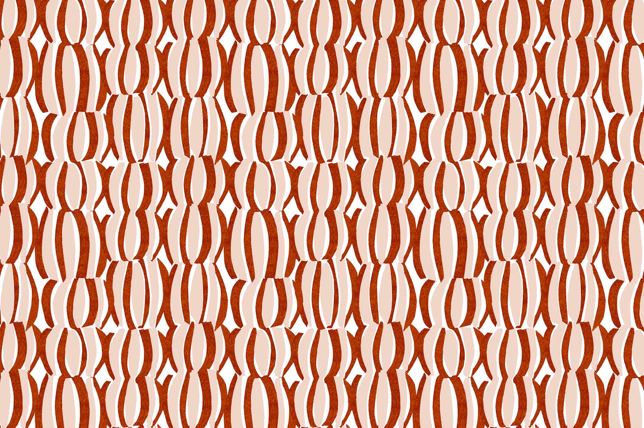 Detail of fabric in an abstract curvilinear print in red and pink on a white field.