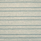 Broadloom carpet with raised cream stripes on light blue. 