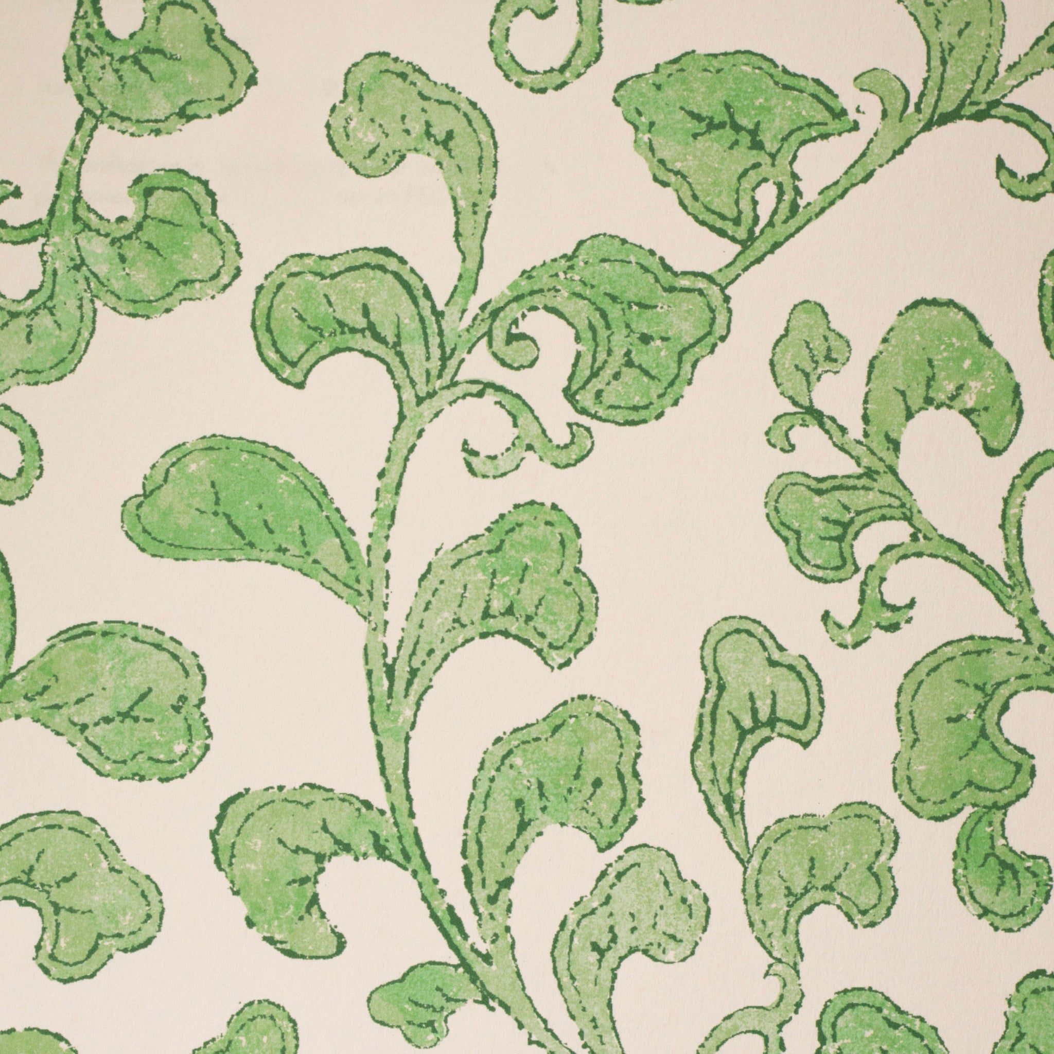 Green leafy pattern on a beige background