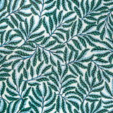 Pattern of green and blue  leaves on a white background